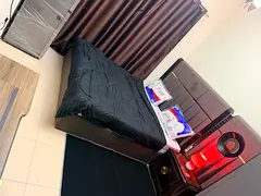 Private room with attached bathroom and balcony