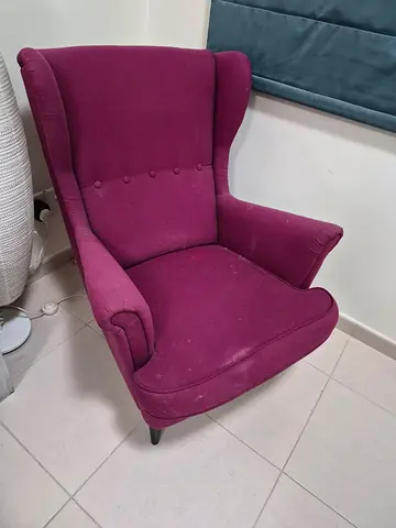 2 Comfortable plum wingback accent chair.