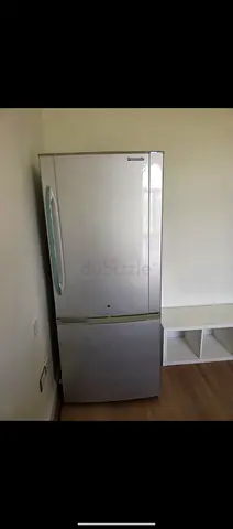 Silver bottom-freezer refrigerator - good working condition