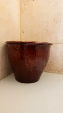 Brown ceramic plant pot / decorative planter