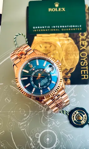 Rolex Sky-Dweller  Everose gold with a striking blue-green