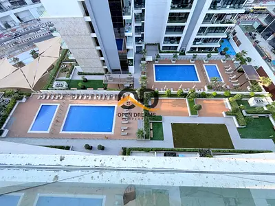 Elegant | Semi furnished 2-Bedroom Apartment | Pool View
