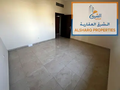 Two-bedroom apartment with a living room available for annual rent in Al Rawda 3, Ajman. The unit features exceptionally spacious areas, a separate li