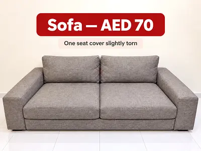 Grey two-seater sofa - AED 70