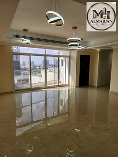 3-bedroom apartment with a living room in Al Rawda 2, free parking, easy access to main roads, and c