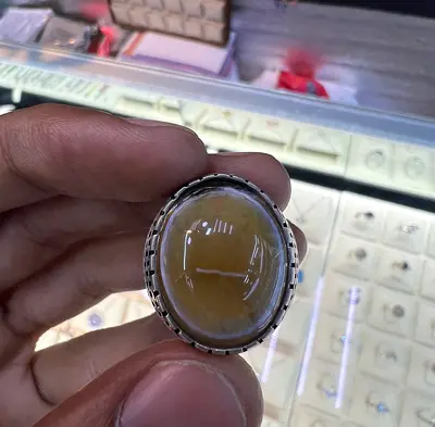 Silver men's ring with large oval yellow aqate cabochon stone