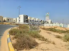 Residential-commercial land for sale in the Al Yasmeen area of Ajman. The plot covers an area