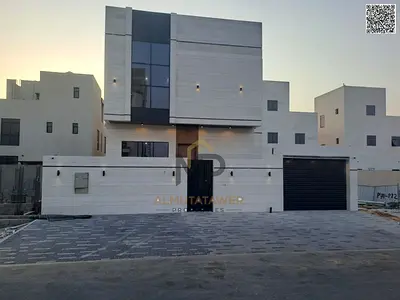 Villa for sale|ajman|al bahia area|5 master rooms, majlis, 2 halls, maid room|freehold|price included registration, water and electricity fees.