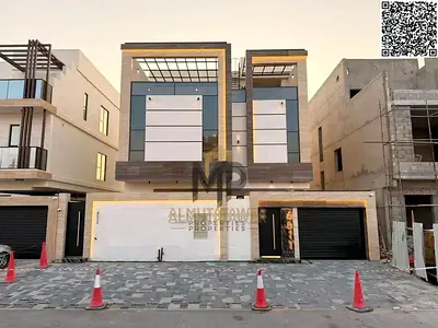 Luxury villa for sale in Al Helio 2, Ajman. Featuring a modern design and high-end finishes, this p