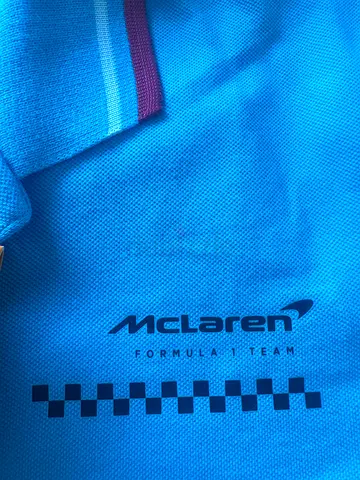 Official Castore McLaren F1 branded blue sports polo top with original tag Size JL