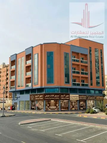 An excellent investment opportunity to own a residential and commercial building in Al Rashidiya 2, Ajman, located next to Falcon Towers in a prime a