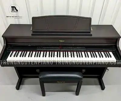 Roland HP7DMH Piano. Japan made. In perfect working. Cash on Free delivery with six months warranty.