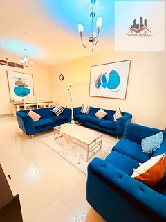 Sharjah Al Taawun, two-bedroom apartment, hall, kitchen, two bathrooms and balcony