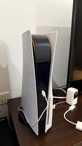 PS5 Disc Edition + 2 DualSense Controllers + 4 Games