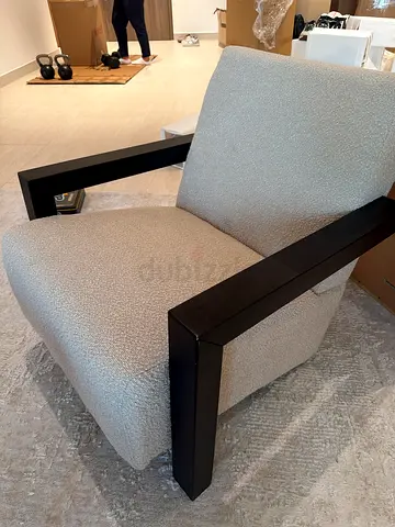 Modern boucle accent chair with dark wood frame — good condition