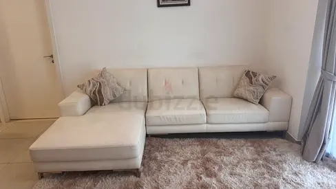 Light beige L-shaped 4-seater sofa with chaise lounge - good condition