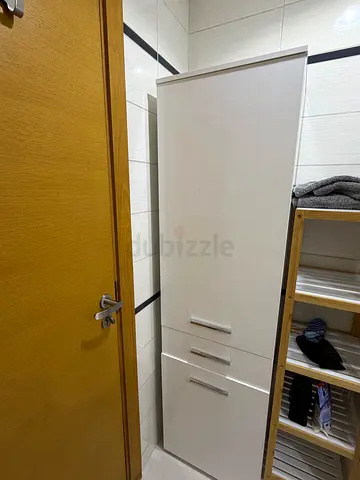White Tall Storage & Laundry Cabinet - Perfect Condition (6 Months Old)