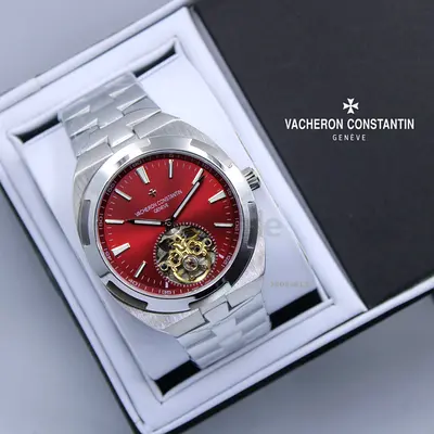 Vacheron Constantin stainless steel automatic watch with red dial and open heart
