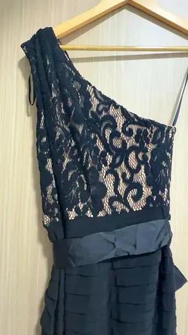 Elegant one-shoulder black evening/gown dress with lace bodice and satin waist bow from LE CHATEAU