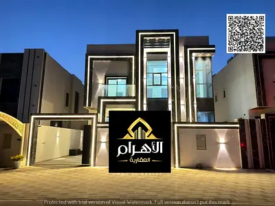 A luxurious two-story villa with a rooftop terrace in Ajman. Includes electricity, water, and air c