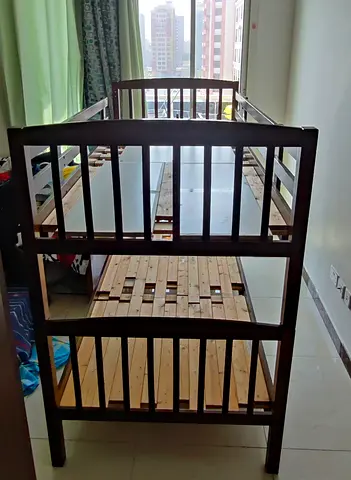 Wooden Bunk bed Bed - Solid Frame, Excellent Condition. Can be detached and used as two single beds.