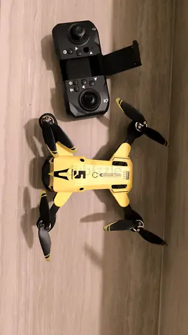 Foldable Yellow Quadcopter Drone with Controller — Good Working Condition