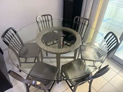 Crate and Barrel Dining Set - Round Dining Table with Glass Top and Six Metal Chairs