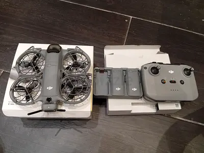 DJI Neo 2 Drone with Controller and 2 Extra Batteries (Good Condition)