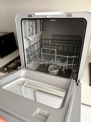 Compact countertop dishwasher in good working condition