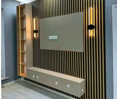 Modern wall-mounted TV entertainment unit with shelving and LED lights