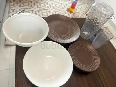 Set of mixed bowls, plates and pitchers - good condition