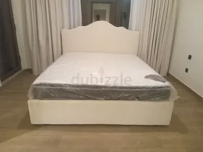 Queen upholstered bed frame with headboard – cream, good condition
