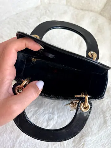 Lady Dior mini ( shiny leather ) patent leather handbag with gold hardware