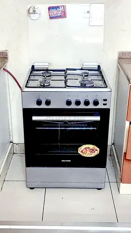 4-burner Gas Cooker with Oven - Good Working Condition