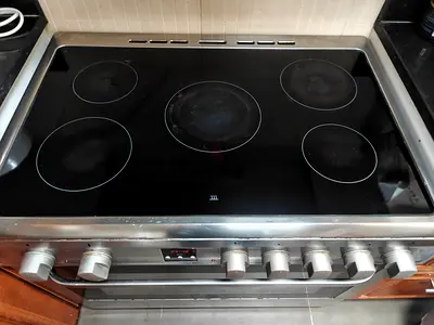 Hoover cooker with 5 hotplates, oven and rotisserie.
