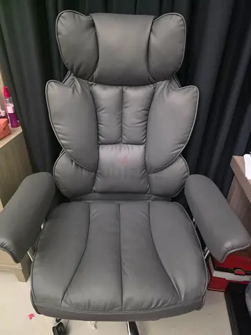 Grey leather recliner armchair in good condition