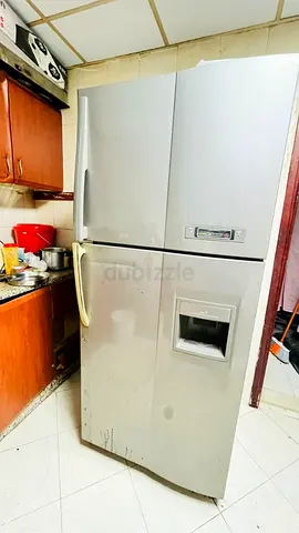 Double-door refrigerator with water dispenser, used available for sale