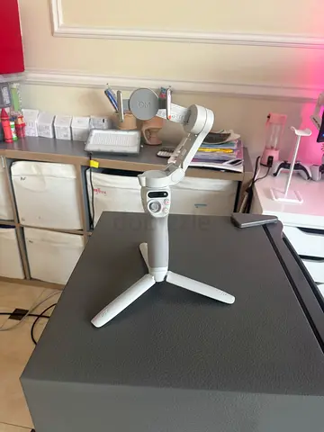 DJI Osmo Mobile SE Gimbal + Tripod – Excellent Condition