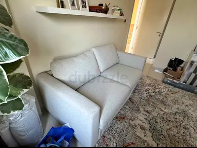 Light grey 3-seater fabric sofa in good condition