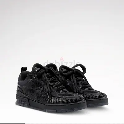 Black low-top designer sneakers - men's size (used)
