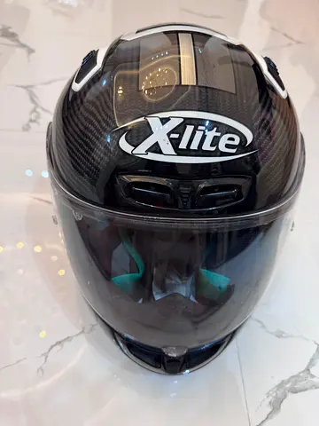 X-lite X-803 Carbon Fiber Helmet in Size XL, made in Italy. It comes bundled with a Sena 50S Bluetoo
