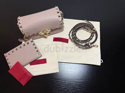 Valentino Garavani Rockstud Mini Shoulder Bag in elegant blush pink with gold tone hardware