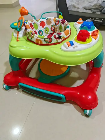 Baby activity walker with detachable toys - good condition
