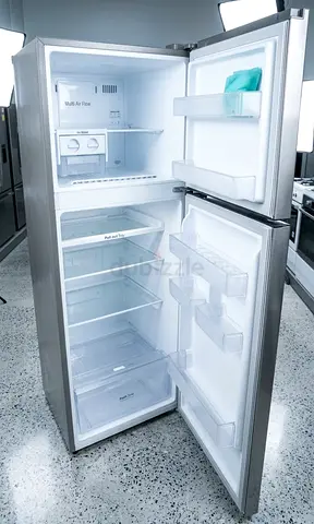 Used Silver Double-Door Refrigerator - Good Working Condition