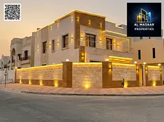 Modern corner villa, situated at the intersection of two streets, featuring two floors and a rooftop
