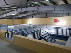 Warehouse for rent with a mezzanine; 44 kVA electrical power.