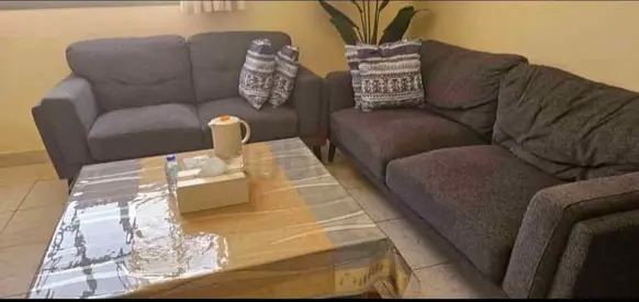 Gray L-shaped corner sofa set — good condition, comfortable seating