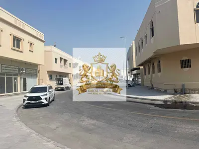 Building for Sale in Al Yarmook, Sharjah | 3 Shops & 4 Apartments | AED 109,000 Annual Income