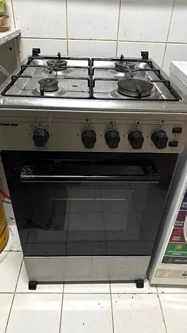 Used 4-Burner Gas Stove with Oven - Stainless Finish