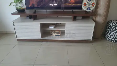 Modern wooden TV cabinet with storage shelves - good condition